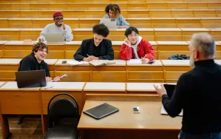 Professor at a German university giving lecture to students